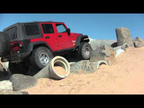 Clayton Off Road JK Long Arm Climbs man made Tierra Del Sol obstacle