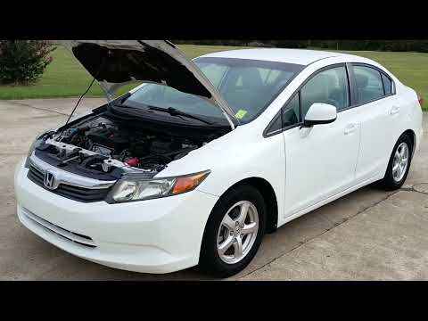 2012 White /GRAY Honda Civic (19XFB5F58CE) with an 1.8L L4 SOHC 16V CNG engine, 5-Speed Automatic transmission, located at 17760 Hwy 62, Morris, OK, 74445, (918) 733-4887, 35.609104, -95.877060 - 2012 HONDA CIVIC DEDICATED CNG (RUNS ONLY ON COMPRESSED NATURAL GAS) HAS A 1.8L 4 CYLINDER ENGINE AND IS 2WD. FEATURES MANUAL SEATS, POWER LOCKS, POWER MIRRORS, POWER WINDOWS. HAS AM/FM RADIO, CD PLAYER, AUX PORT, CRUISE CONTROL, MULTI-FUNCTION STEERING WHEEL CONTROL, HANDS FREE CALLING, AND TRACTIO - Photo#30