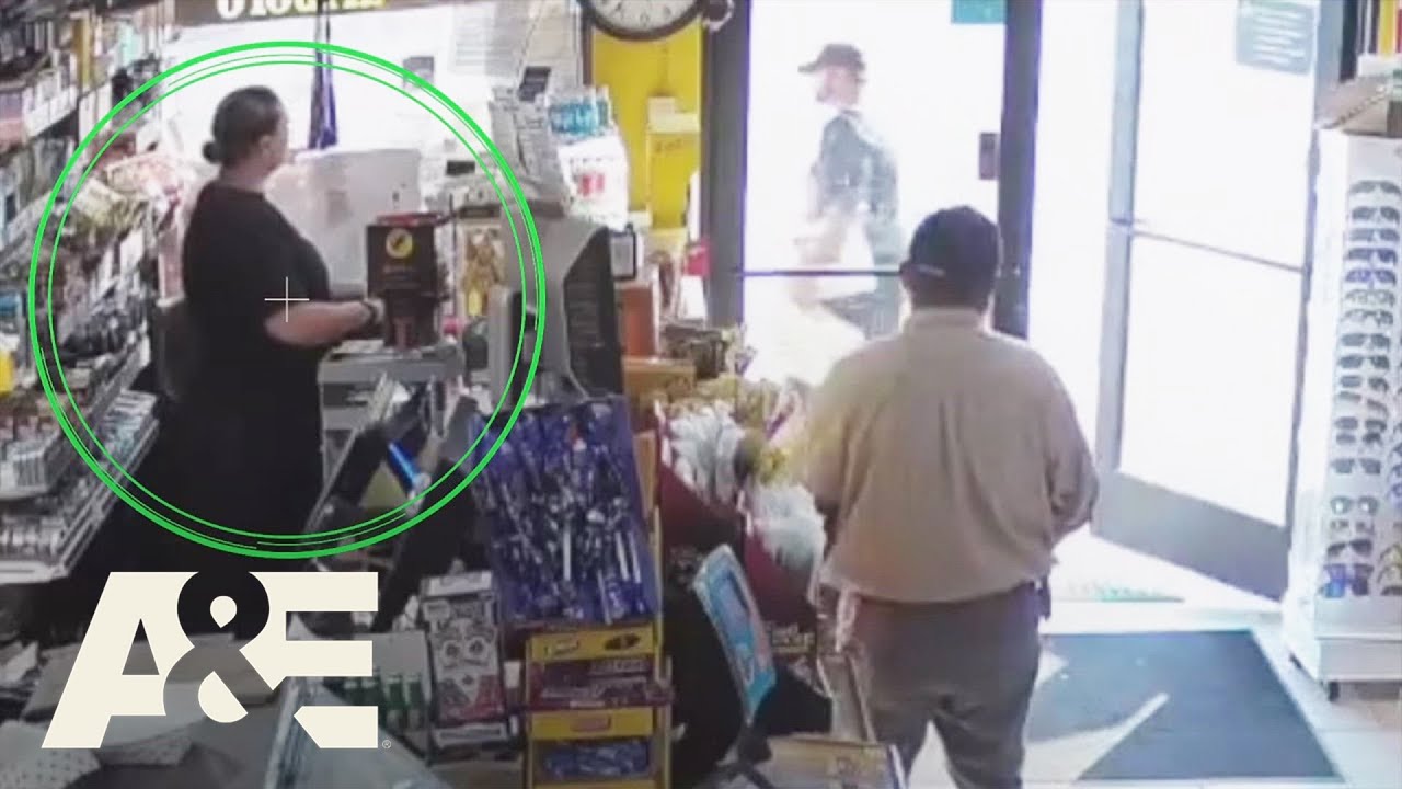 Suspect Crashes Stolen Car and Flees Into Orchard | Fugitives Caught on Tape | A&E