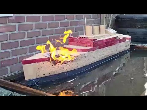 Cardboard Ship On Fire And Sinking: The Passenger Ship Titanic Paradise