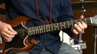 How to Play Guitar Hero III Songs on Electric Guitar : How to Play Holiday in Cambodia by Dead Kennedys