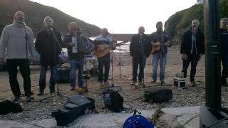 Port Isaac's Fisherman's Friends singing When the Boat Comes In 2016.