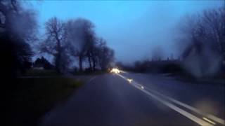 preview picture of video 'VW Beetle overtakes motorcyclist in the rain in Double White Lined zone - Burley Hil 29 1 2014 5pm'