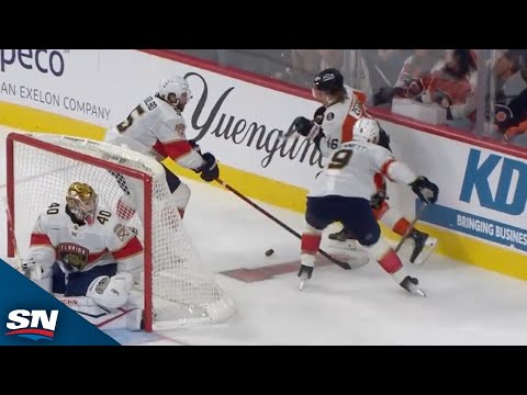 Flyers' Zegras Evades Two Panthers Behind The Goal To Set Up Couturier