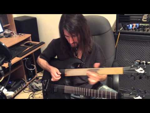 Bumblefoot recording fretless guitar solo to 