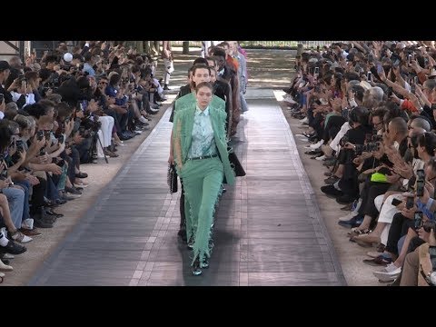 Gigi Hadid and fellow models on the runway for the Berluti Fashion Show