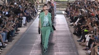 Gigi Hadid and fellow models on the runway for the Berluti Fashion Show