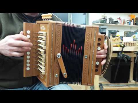 Beltuna Melodeon in D. Cherry wood.