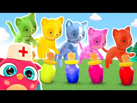 Five little kittens jumping on the bed and Hop Hop the owl singing a song about it.