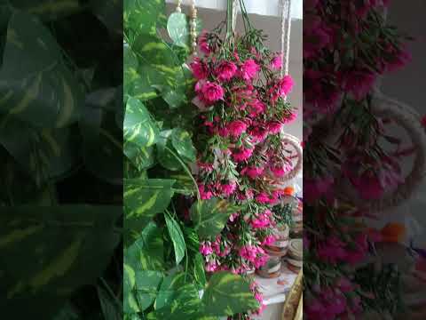 Artificial flowers available at Param Hans shop