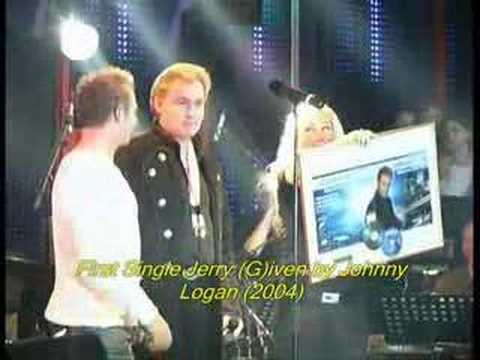 Jerry Given johnny Logan presents first copy.