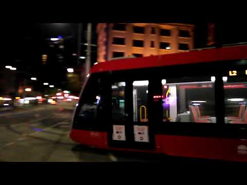 The Light Rail on George Street in nighttime Sydney , NSW Australia