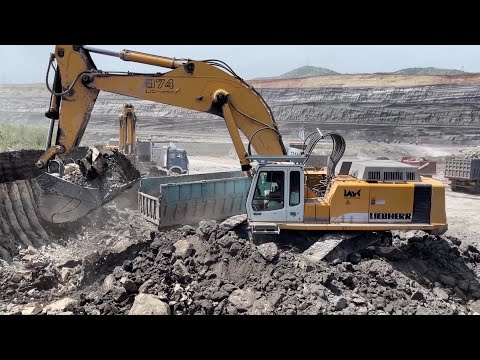 Two Liebherr 974 Excavators Loading Overburden On 4 Axle Trucks - Ascon Ltd