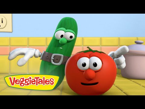 Animated VeggieTales scene: a green cucumber in a belt beside a smiling red tomato in a bright yellow-tiled kitchen near a pot.