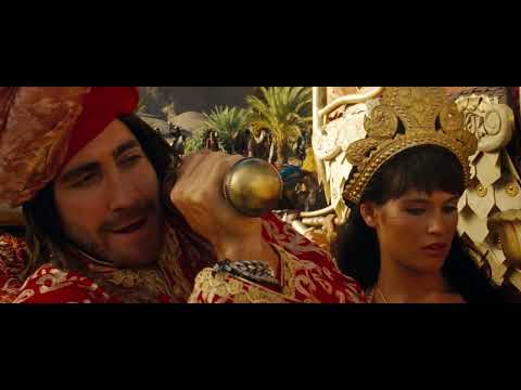 Swordfight and collapsing ruins as the score swells with choir and percussion