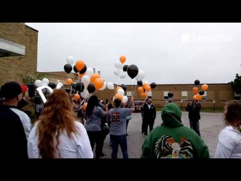 Manual Academy students honor fellow student, Dequarrius Sims, who was shot and killed 10 years ago