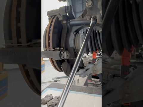 Caliper bracket removal with 17mm socket & breaker bar during the front brake job #diy #autorepair