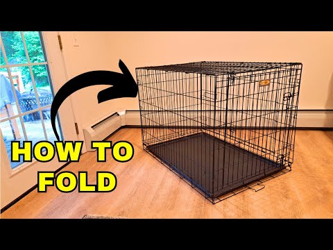 Part of a video titled How to Fold a Metal Dog Crate - YouTube