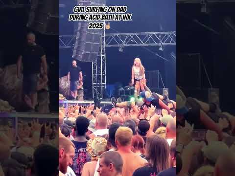 Girl crowdsurfing on Dad