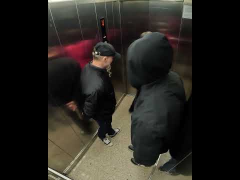Man Harasses Woman in an Elevator