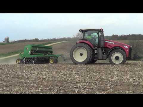 Seeding oats, peas and alfalfa mix with a new Versatile 290 tractor and a John Deere drill
