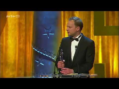 Mads Mikkelsen accepting a marriage proposal from Maciej Stuhr