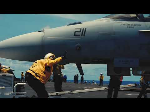 Aviation Boatswain’s Mates (Handling) perform their daily underway tasks onboard Reagan
