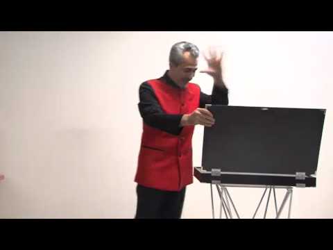 Appearing a Hamed's CD Player from Empty Briefcase ( by Tora Magic) www.toramagic.com