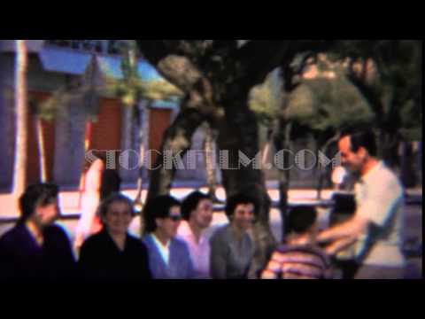 1964: Dad publically spanking boy with laughing complacent women. ROME, ITALY