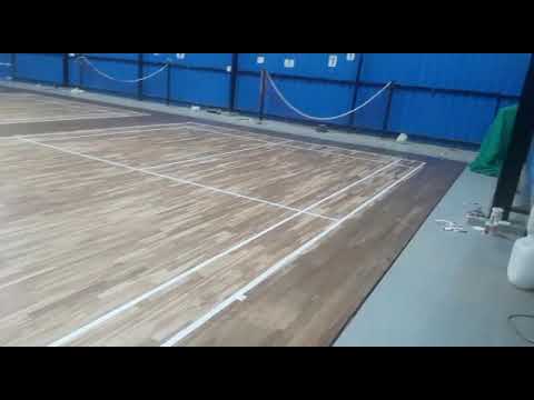 Indoor wooden badminton court flooring service