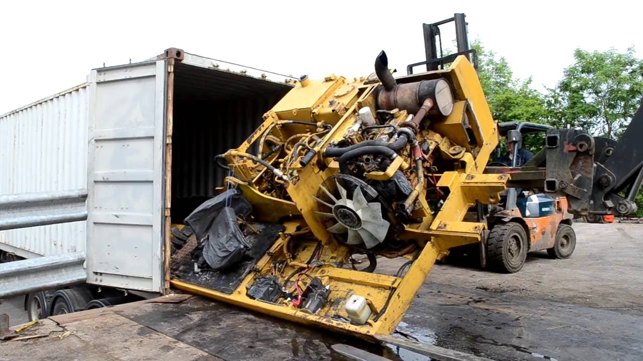 Loading Cat 320D Excavator Into A 40ft Shipping Container