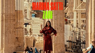 Kadr z teledysku Ζάρι (Zári) tekst piosenki Marina Satti