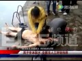 Female Doctor And Nurse Relay Cpr On Drowned Man