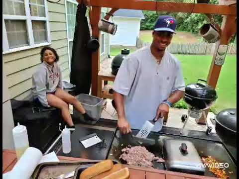 Philly cheese steak hoagies and hash brown patties on...