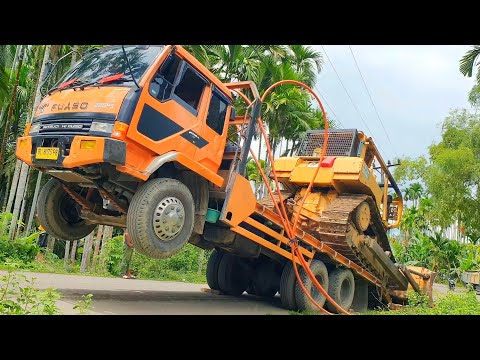 Process of Raising and Lowering the CAT D6R XL Bulldozer to the Self Loader Trailer