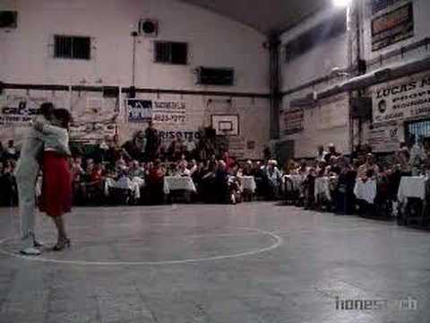  Coca Cartery  and  Osvaldo Cartery  are  dancing  to  a  tango
