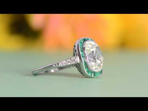 4.60-Carat  Antique Diamond Engagement Ring with Emerald Halo