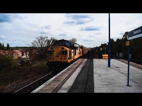 Class 37 'Tractor' 37099 "Merl Evans" propels Network Rail DBSO 9701 through Swinton on 3Z01.