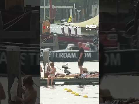 Heatwave fuels rise in wild swimming across Amsterdam #nocomment #youtubeshorts #shorts #amsterdam