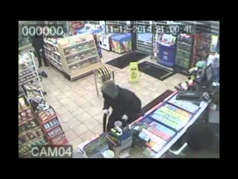Security camera video of a convenience store robbery at Eglinton Avenue West and Locksley Avenue