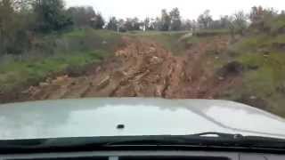 preview picture of video 'Opel Frontera 4x4 over steep hill with mud'