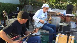 Sauce Boss and JP Soars play "Lonesome Rider". Gutbucket Blues with cigar box and steel guitar.