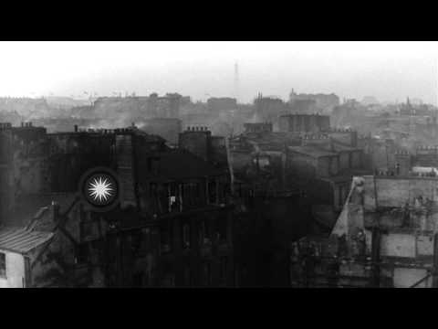 People move in a narrow street surrounded with old and damaged buildings in a slu...HD Stock Footage