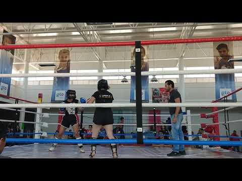 Pelea Kick Boxing mujer