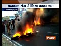 Protesters set ablaze vehicles in Gujarat