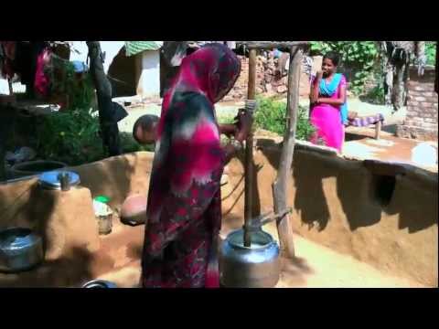 Village Woman Churning Butter