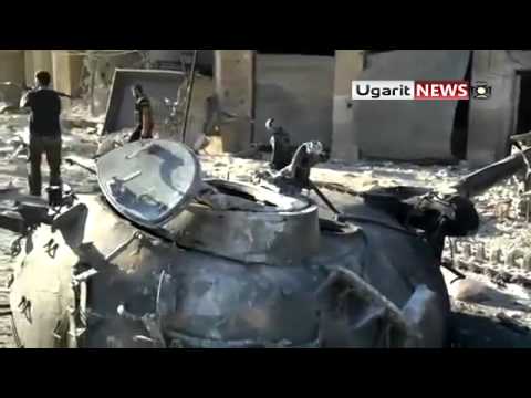 تدمير دبابة في55 بعد استهدافها من قبل كتيبة فجر الإسلام في مدينة إدلب