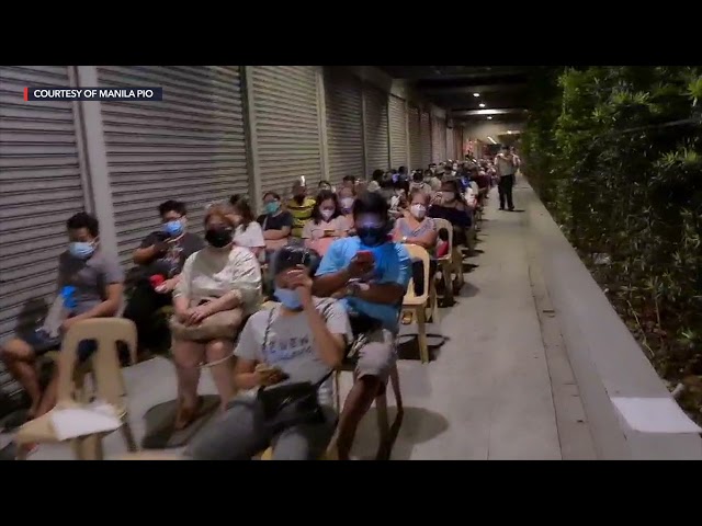 Hundreds queue as Manila expands coverage of Pfizer vaccinations