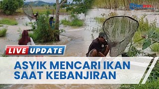 Warga di Panjaratan Kalimantan Selatan Malah Asyik Cari Ikan di Tengah Luapan Air Banjir