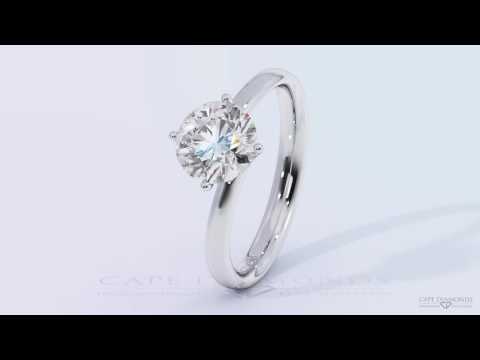 Four claw twist diamond solitaire engagement ring platinum white gold setting